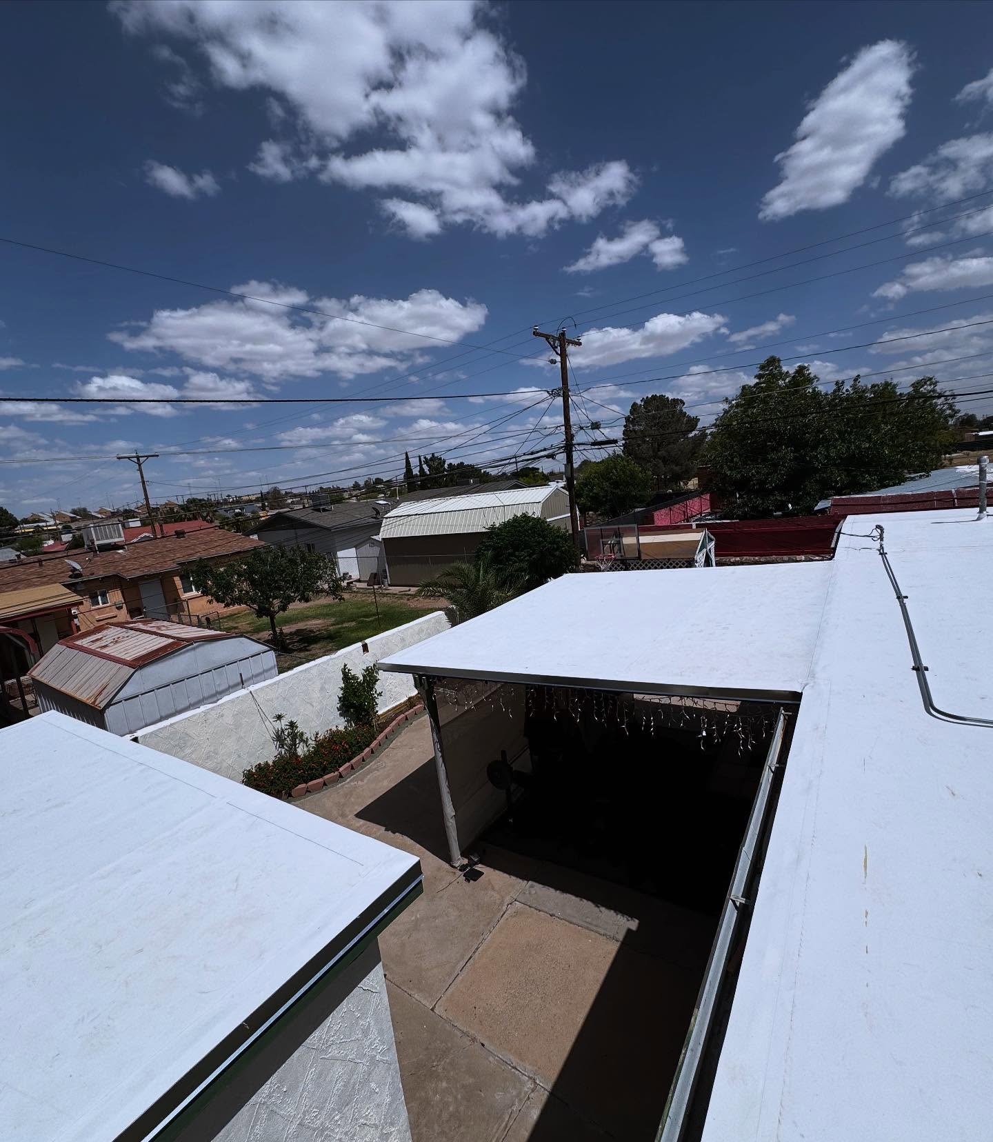 Roof leak repair being performed on El Paso home