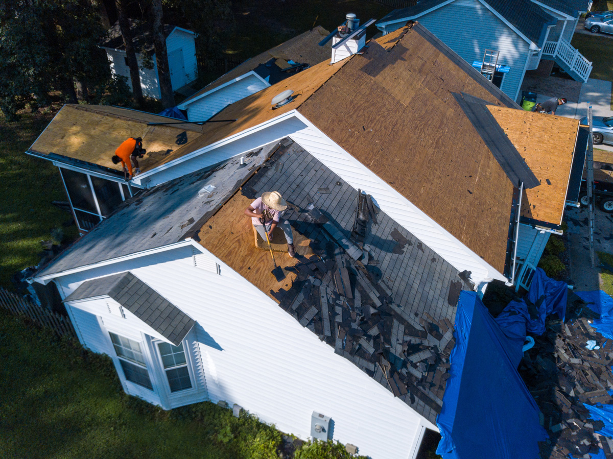 An aerial view of an El Paso home undergoing a roof replacement.